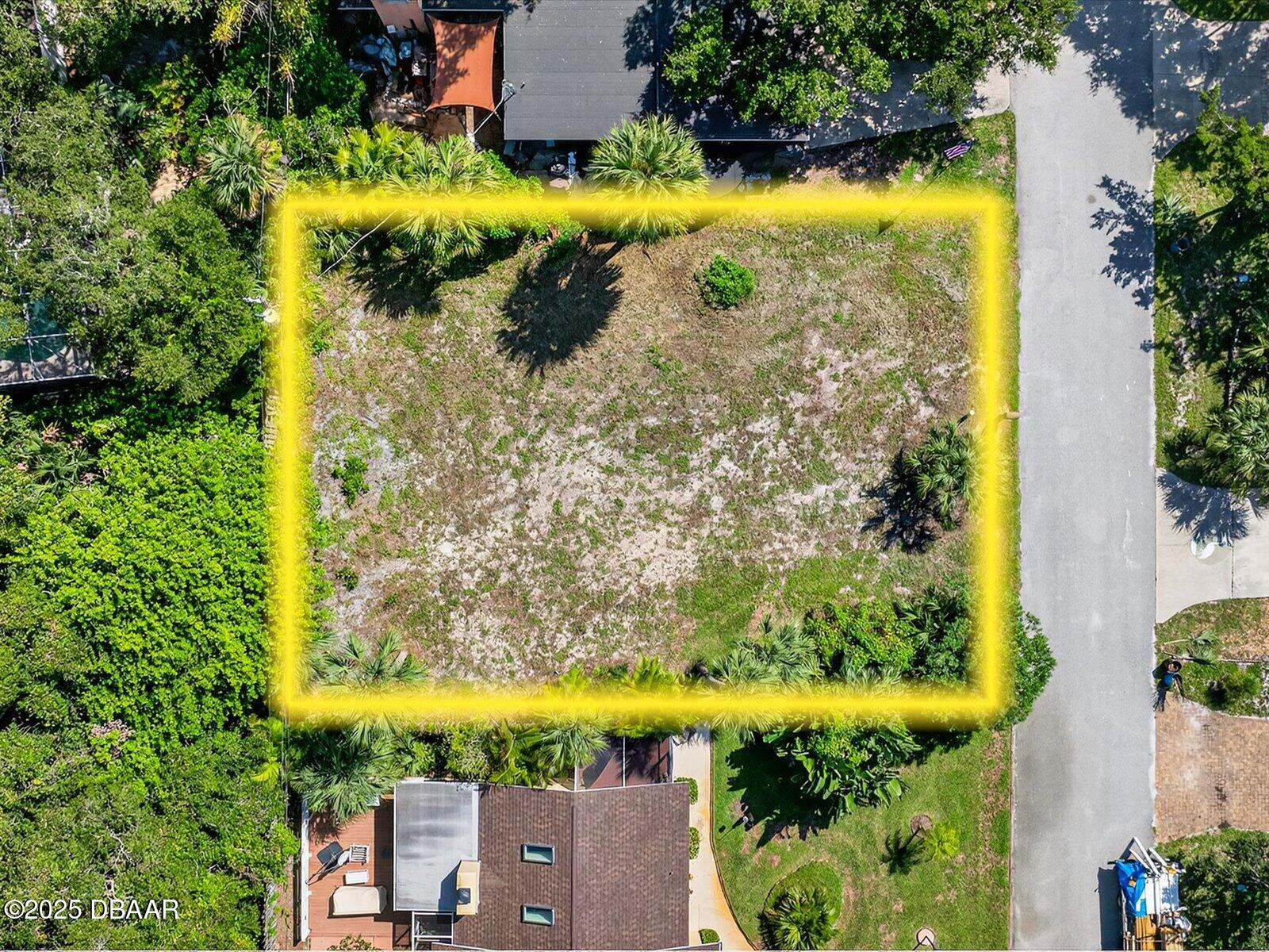 116 Rains Drive Ponce Inlet, FL 32127 - Photo 2 of 14 an aerial view of residential houses with swimming pool and garden