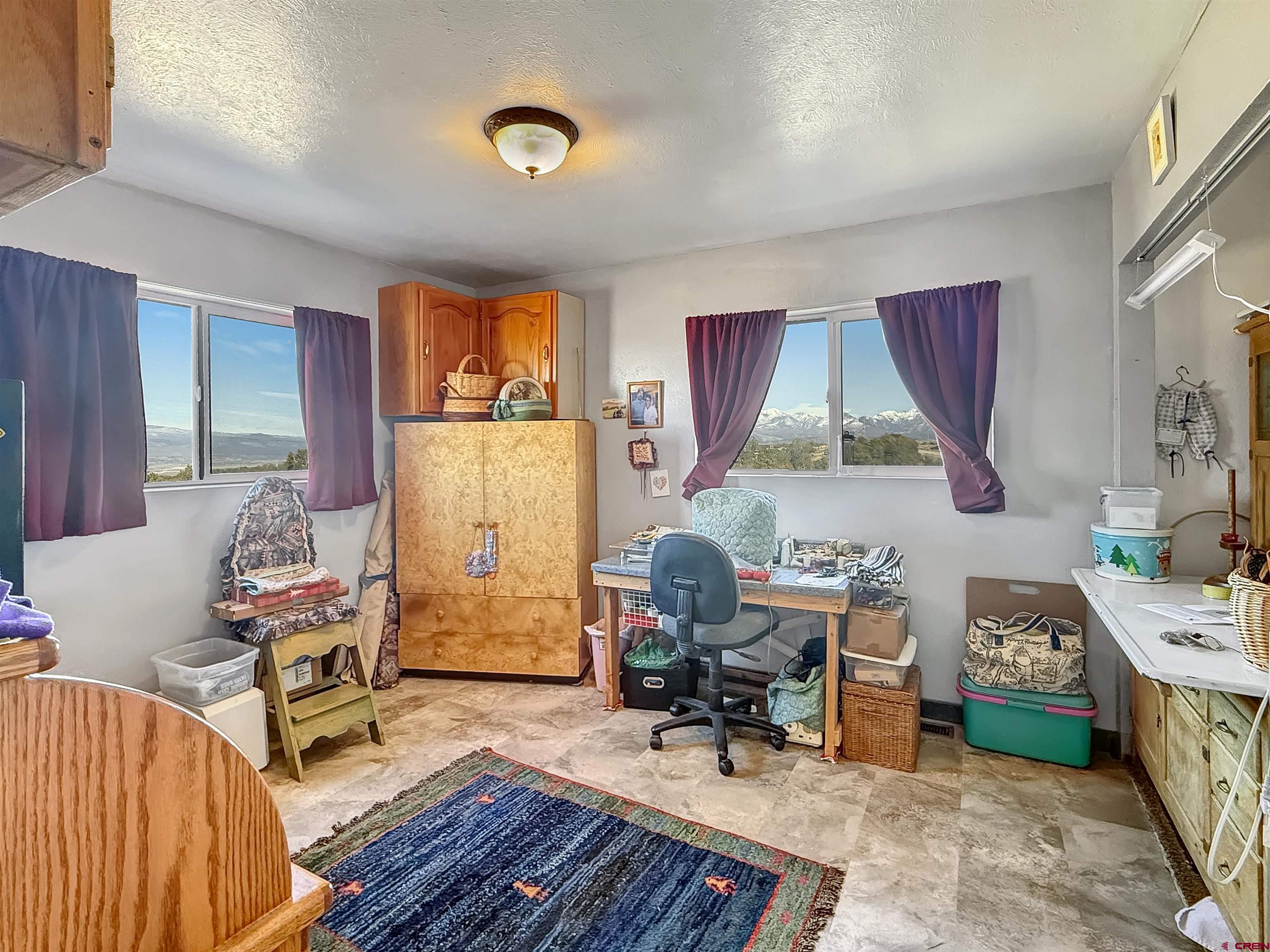 1174 3375th Road Crawford, CO 81415 - Photo 23 of 42 a workspace with workspace and a window