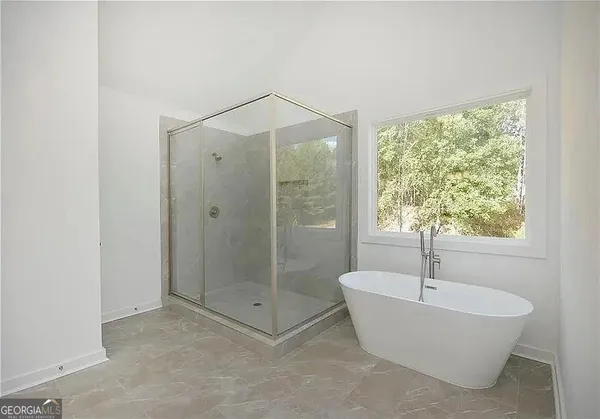 a bathroom with a sink vanity and a mirror