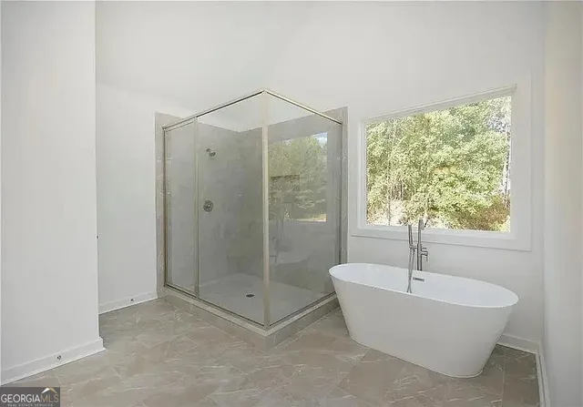 a bathroom with a sink vanity and a mirror