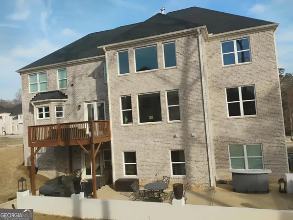 a front view of a house with glass windows