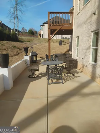 a view of a terrace with seating area