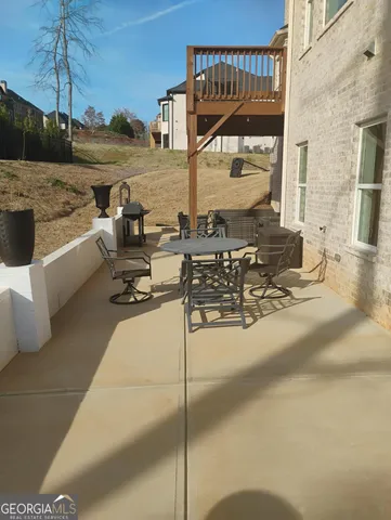 a view of a terrace with seating area
