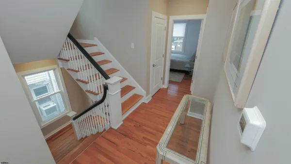 a view of stairs and with furniture