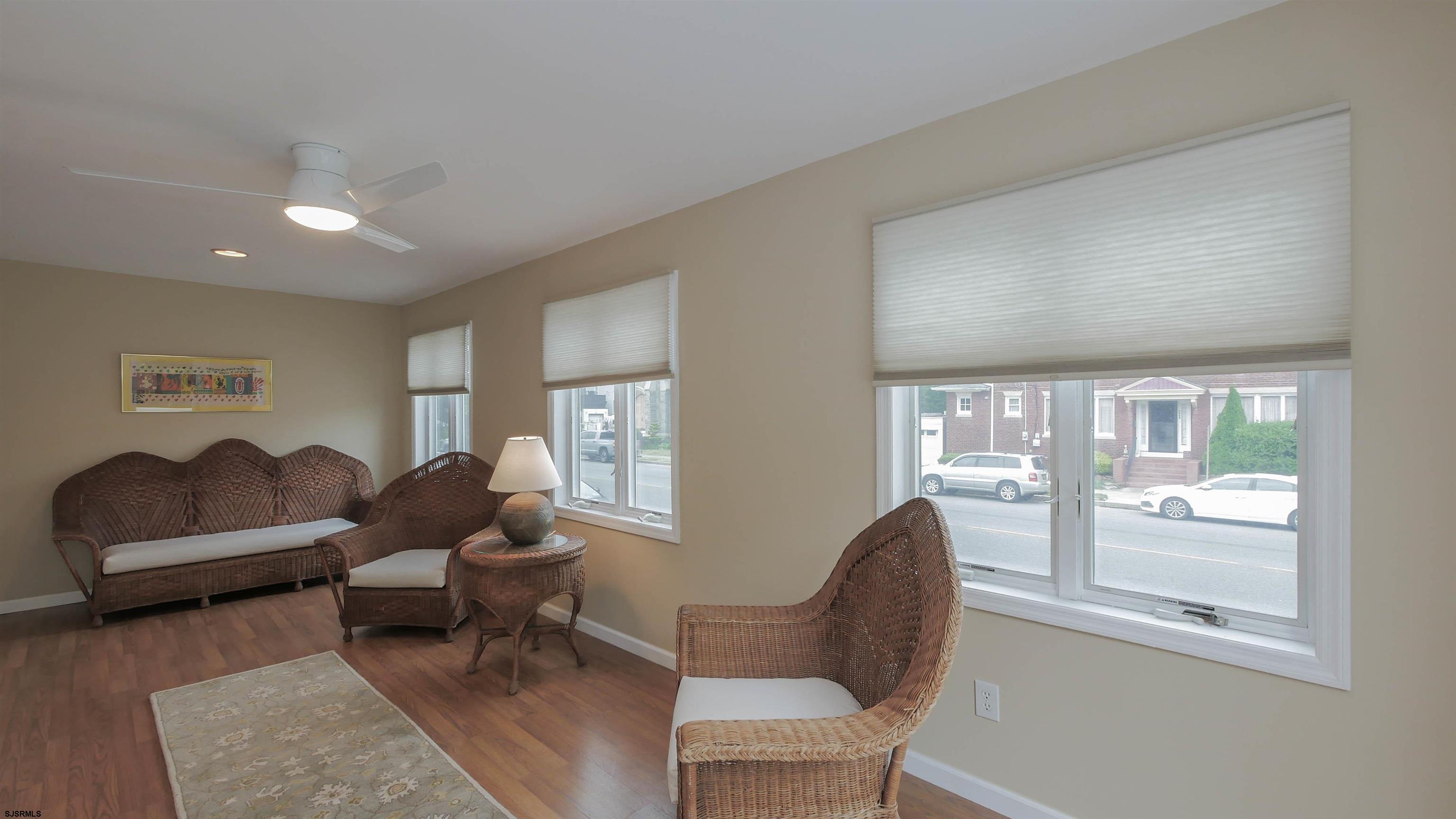 1 North Surrey Avenue, Unit CUSTOMIZE RENTAL Ventnor City, NJ 08406 - Photo 9 of 36 a living room with furniture and a window