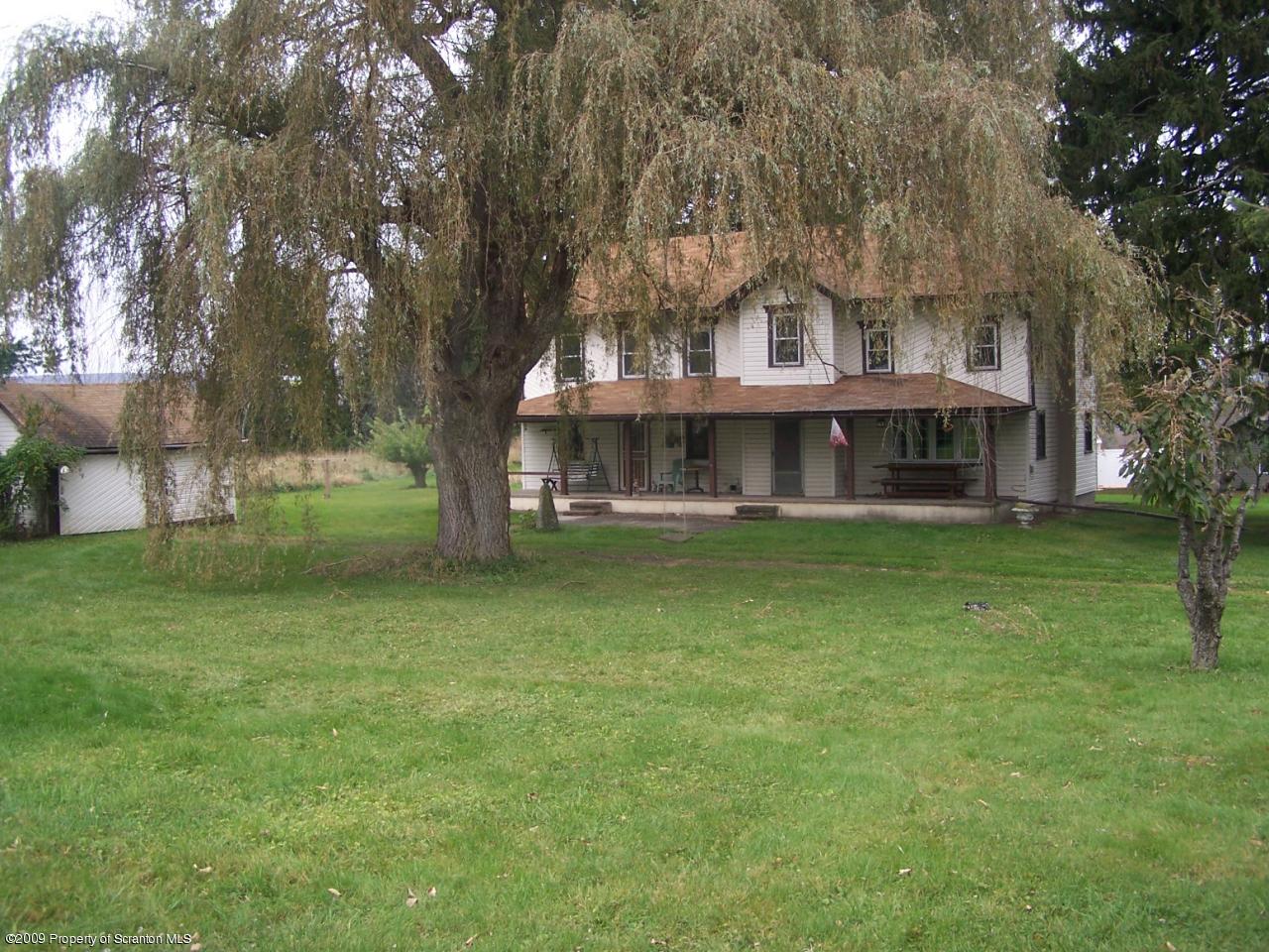 407 Gravity Road Lake Ariel, PA 18436 - Photo 12 of 27 a view of house with a yard