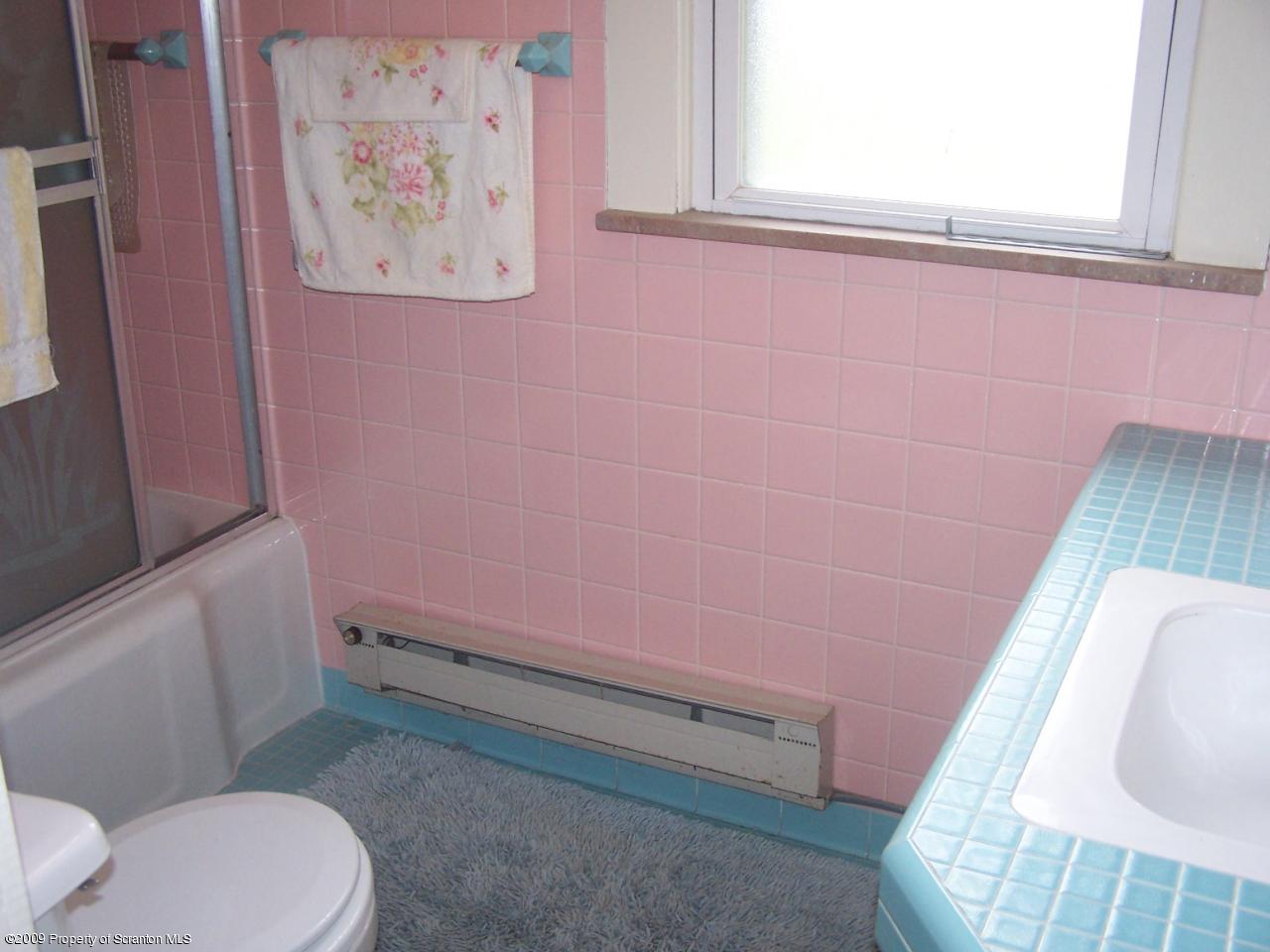 407 Gravity Road Lake Ariel, PA 18436 - Photo 18 of 27 a bathroom with a sink and a toilet