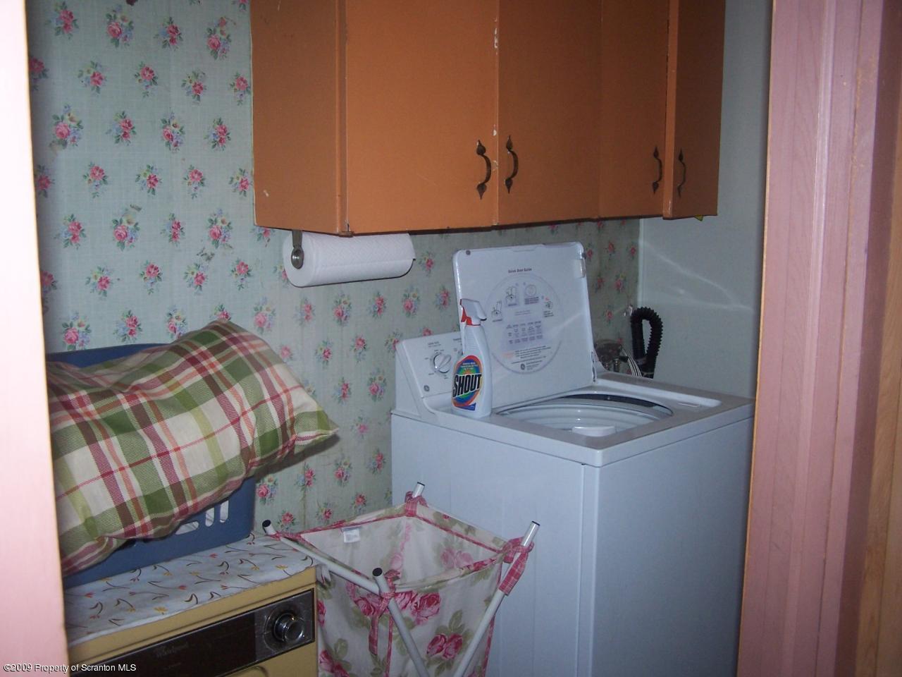 407 Gravity Road Lake Ariel, PA 18436 - Photo 19 of 27 a utility room with dryer and washer