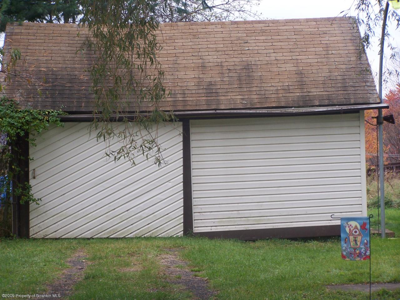 407 Gravity Road Lake Ariel, PA 18436 - Photo 21 of 27 a view of a backyard with plants