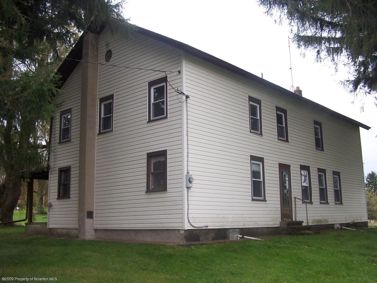 407 Gravity Road Lake Ariel, PA 18436 - Photo 3 of 27 a view of a house with a yard