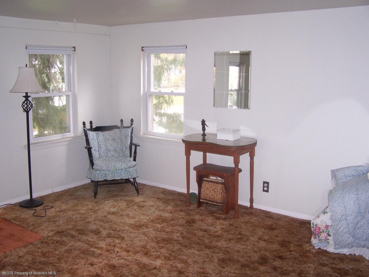 407 Gravity Road Lake Ariel, PA 18436 - Photo 5 of 27 a living room with furniture and a window