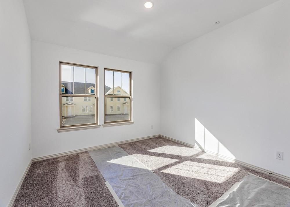 8876 Samara Street Frisco, TX 75035 - Photo 20 of 28 a view of an empty room and window