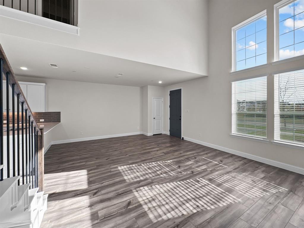 8876 Samara Street Frisco, TX 75035 - Photo 10 of 28 a view of an empty room and window