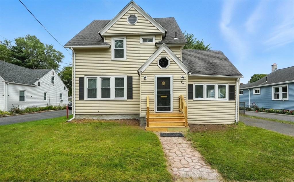 77 Coleman Street Springfield, MA 01109 - Photo 1 of 24 a front view of a house with a yard