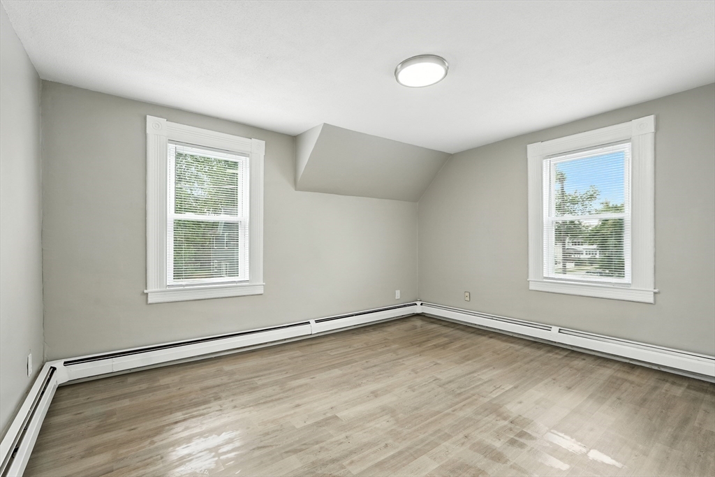 77 Coleman Street Springfield, MA 01109 - Photo 16 of 24 an empty room with a window