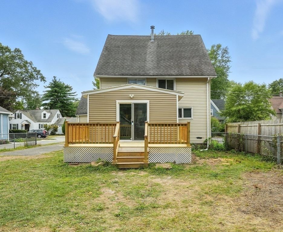 77 Coleman Street Springfield, MA 01109 - Photo 22 of 24 a front view of a house with a yard