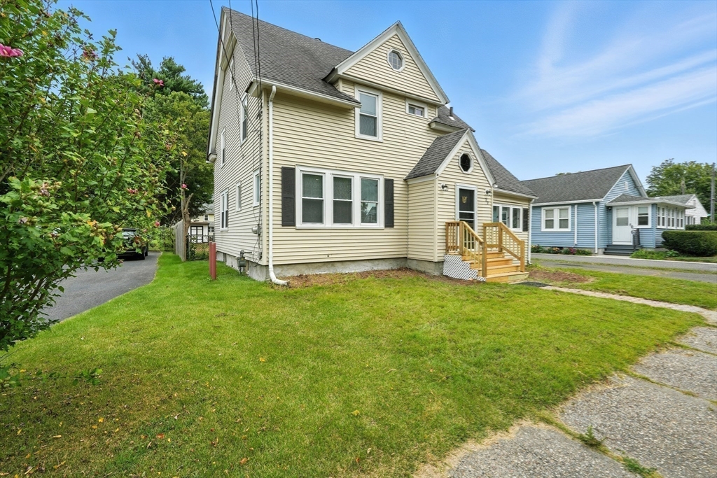 77 Coleman Street Springfield, MA 01109 - Photo 24 of 24 a front view of a house with a yard