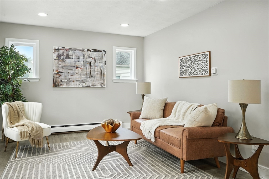 77 Coleman Street Springfield, MA 01109 - Photo 4 of 24 a living room with furniture and wooden floor