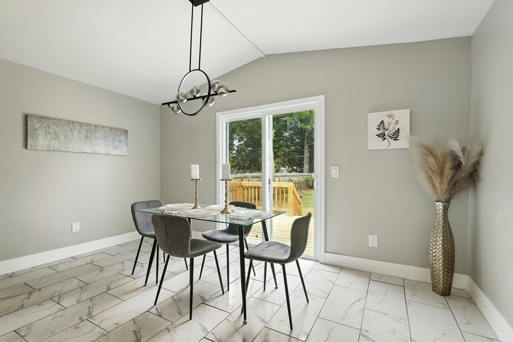 77 Coleman Street Springfield, MA 01109 - Photo 9 of 24 a view of a dining room with furniture window and outside view