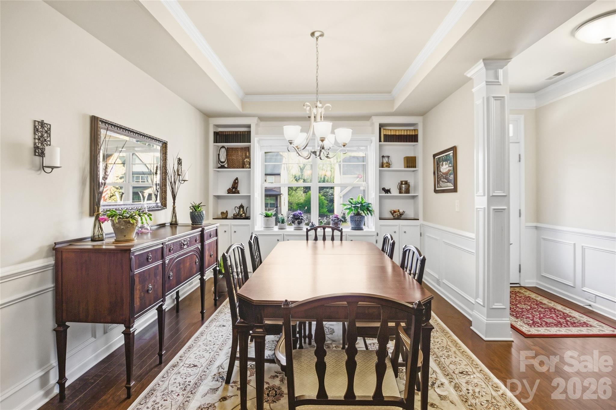 11824 Springpoint Lane Charlotte, NC 28278 - Photo 2 of 26 a view of a dining room with furniture window and wooden floor