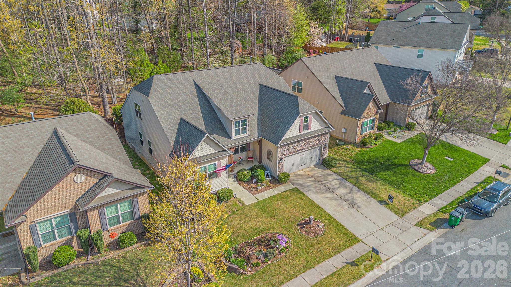 11824 Springpoint Lane Charlotte, NC 28278 - Photo 23 of 26 an aerial view of a house with a yard