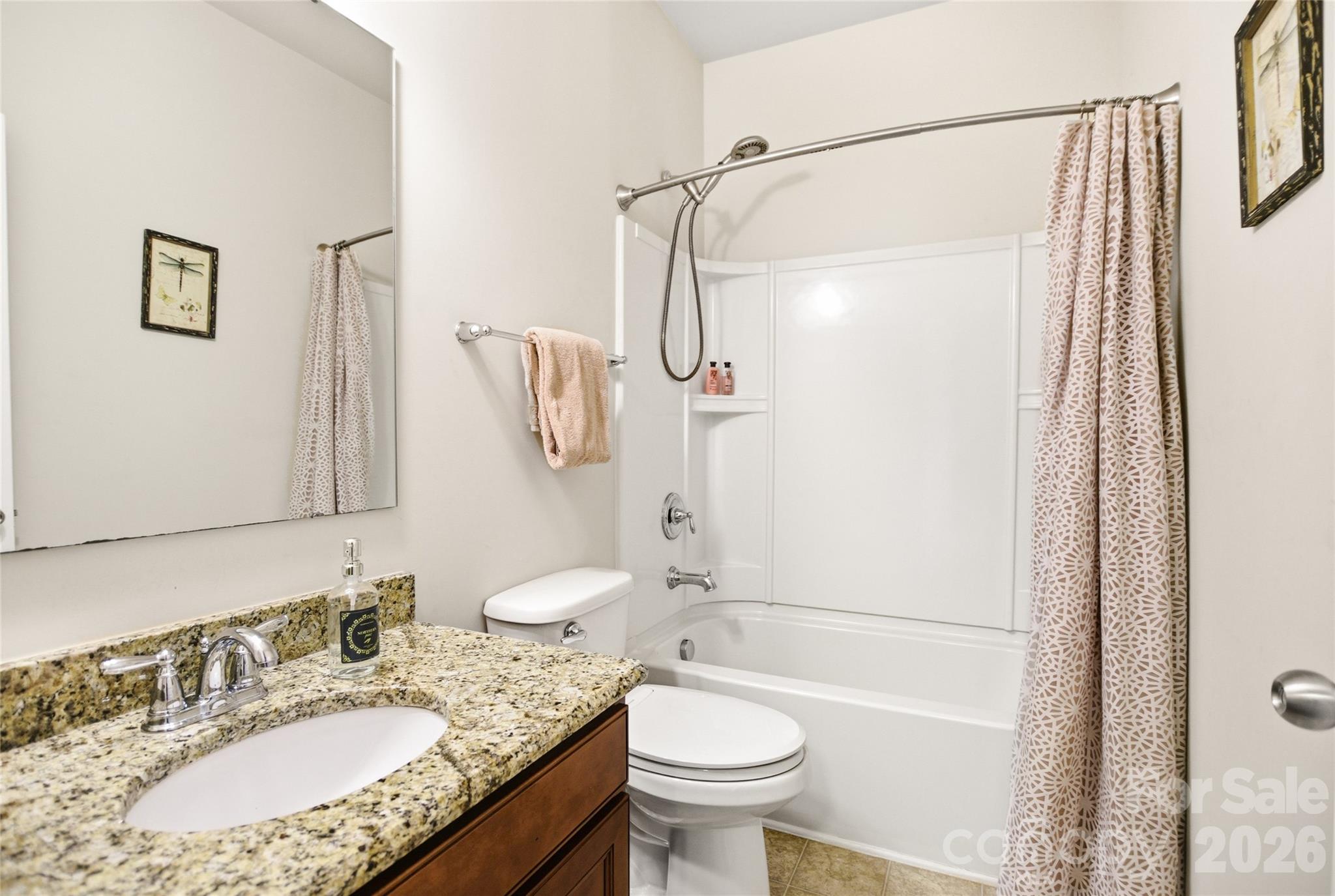 11824 Springpoint Lane Charlotte, NC 28278 - Photo 7 of 26 a bathroom with a granite countertop sink toilet and shower