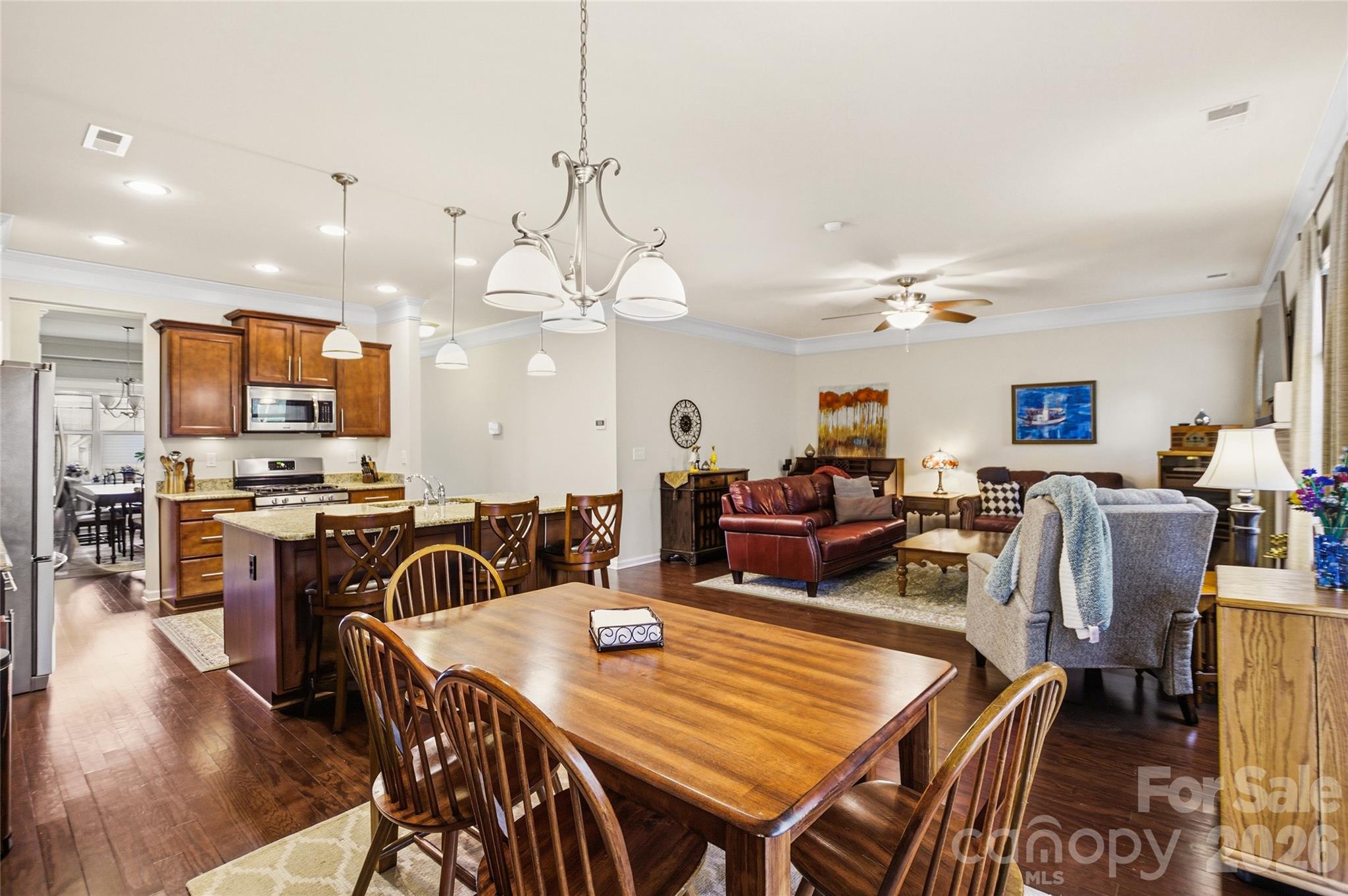 11824 Springpoint Lane Charlotte, NC 28278 - Photo 9 of 26 a view of a dining area with furniture