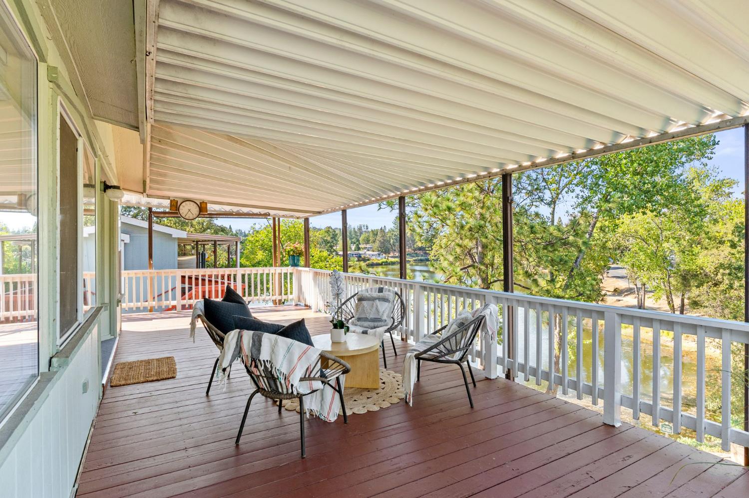4390 Patterson Drive, Unit 218 Diamond Springs, CA 95619 - Photo 33 of 45 a dining room with furniture and wooden floor