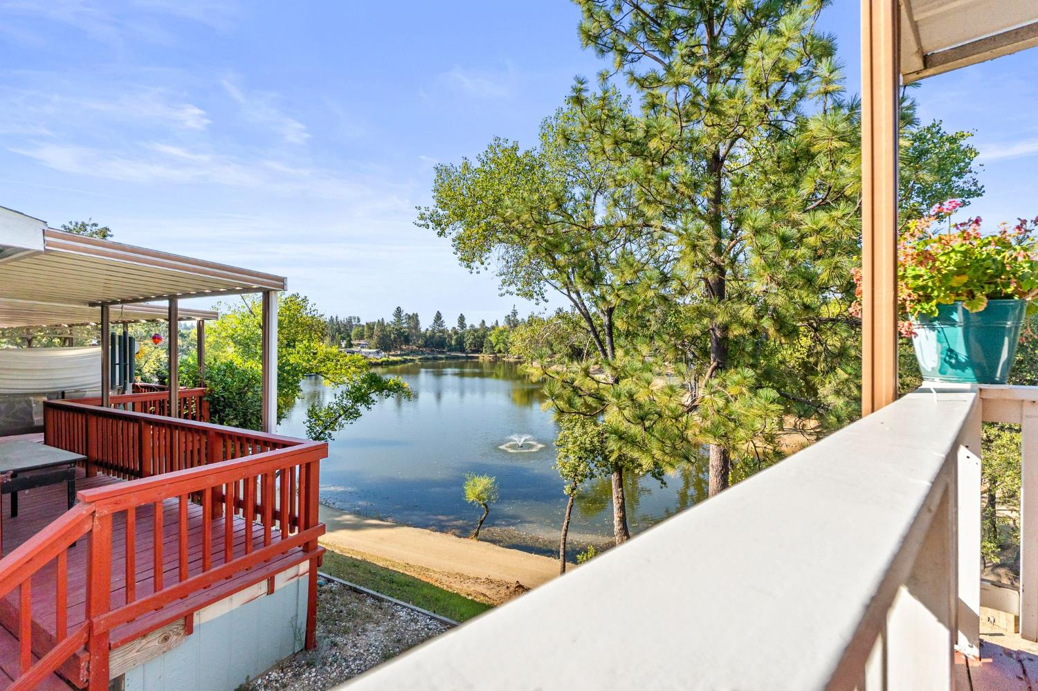 4390 Patterson Drive, Unit 218 Diamond Springs, CA 95619 - Photo 34 of 45 a view of a patio with two chairs next to a yard