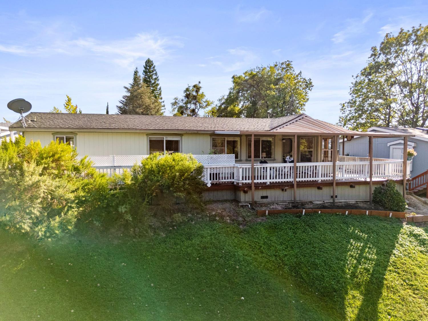 4390 Patterson Drive, Unit 218 Diamond Springs, CA 95619 - Photo 38 of 45 a view of a house with a backyard