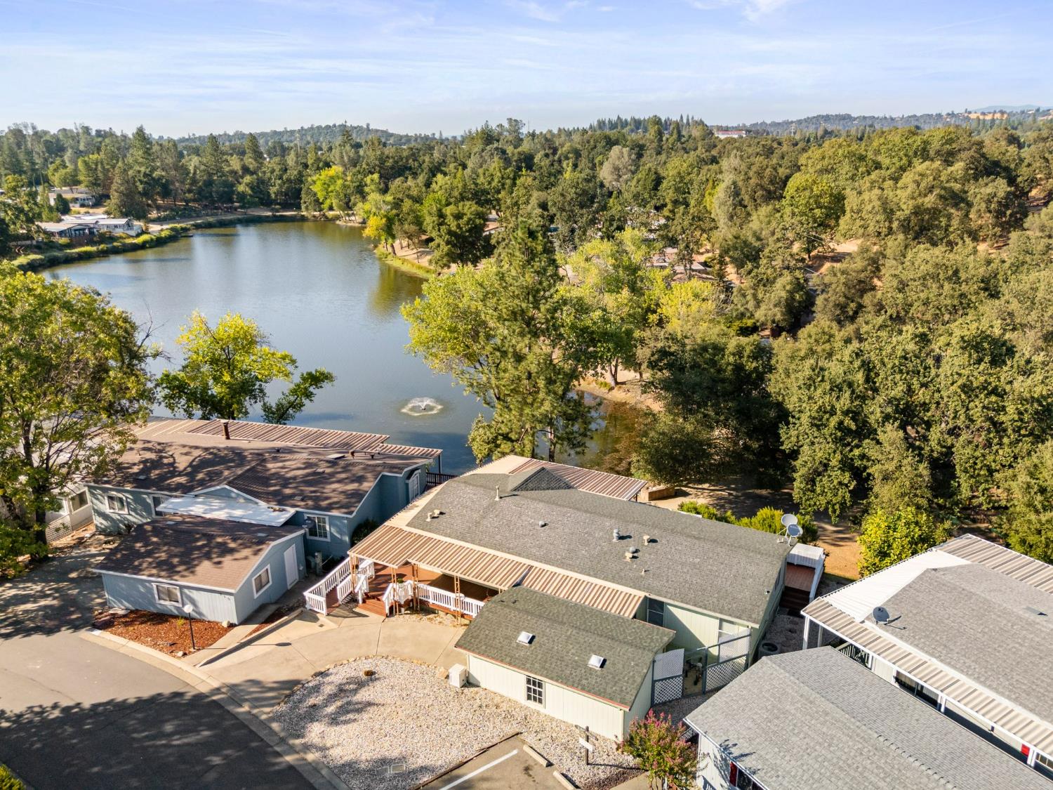 4390 Patterson Drive, Unit 218 Diamond Springs, CA 95619 - Photo 41 of 45 an aerial view of a house with a lake view
