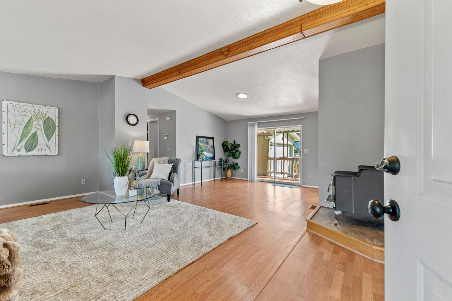 4390 Patterson Drive, Unit 218 Diamond Springs, CA 95619 - Photo 6 of 45 a living room with furniture and a flat screen tv