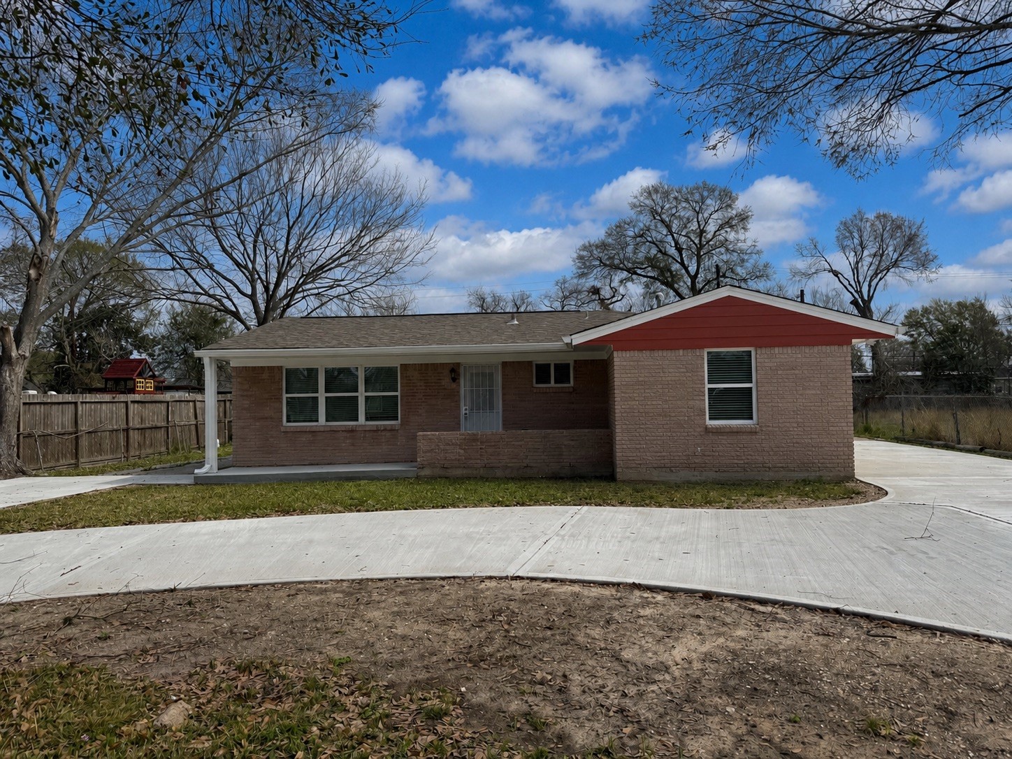 4127 Colgate Street Houston, TX 77087 - Photo 4 of 16 a front view of a house with a yard