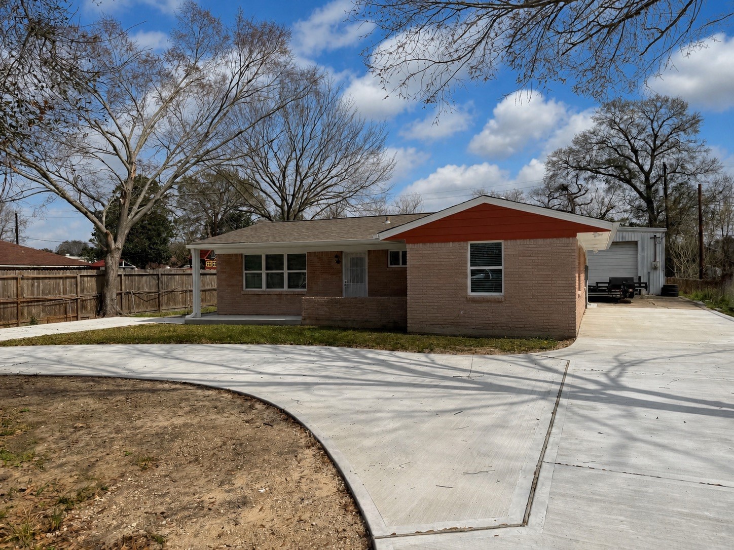 4127 Colgate Street Houston, TX 77087 - Photo 5 of 16 a front view of a house with a yard