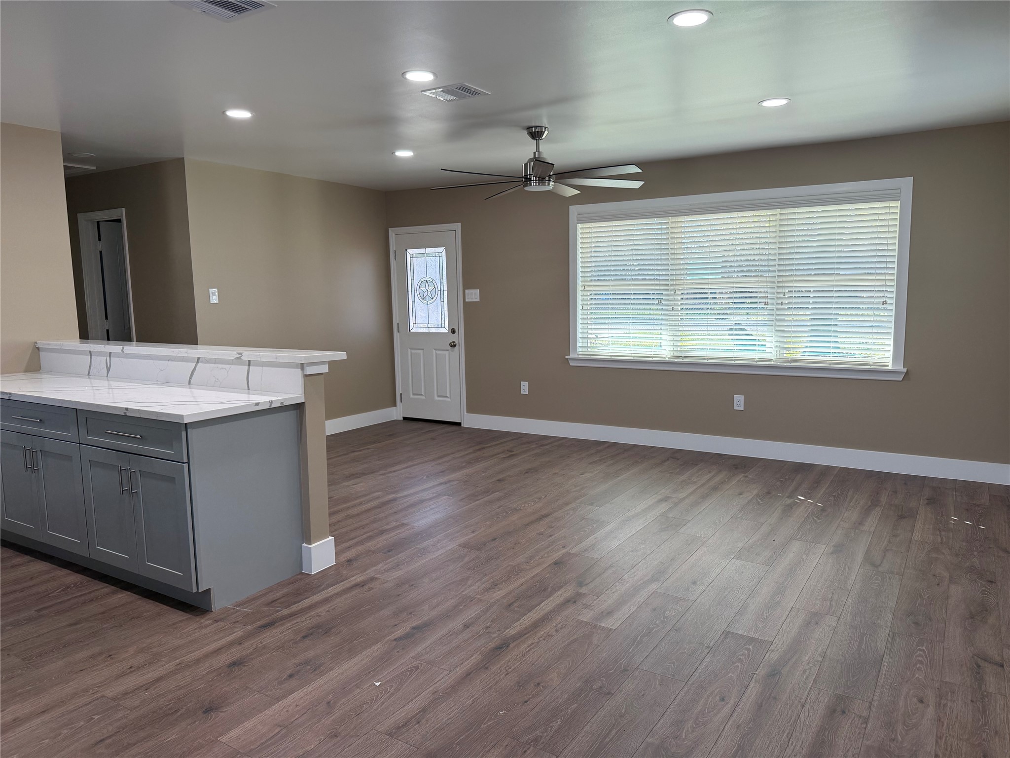 4127 Colgate Street Houston, TX 77087 - Photo 8 of 16 a view of a kitchen counter space with wooden floor and window