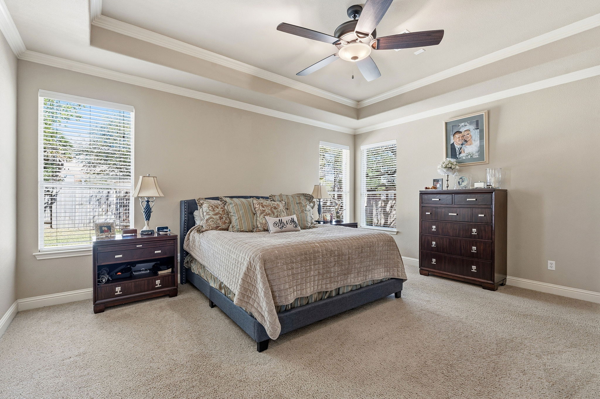 2807 Rambler Valley Drive Cedar Park, TX 78613 - Photo 20 of 38 a spacious bedroom with a bed and a dresser