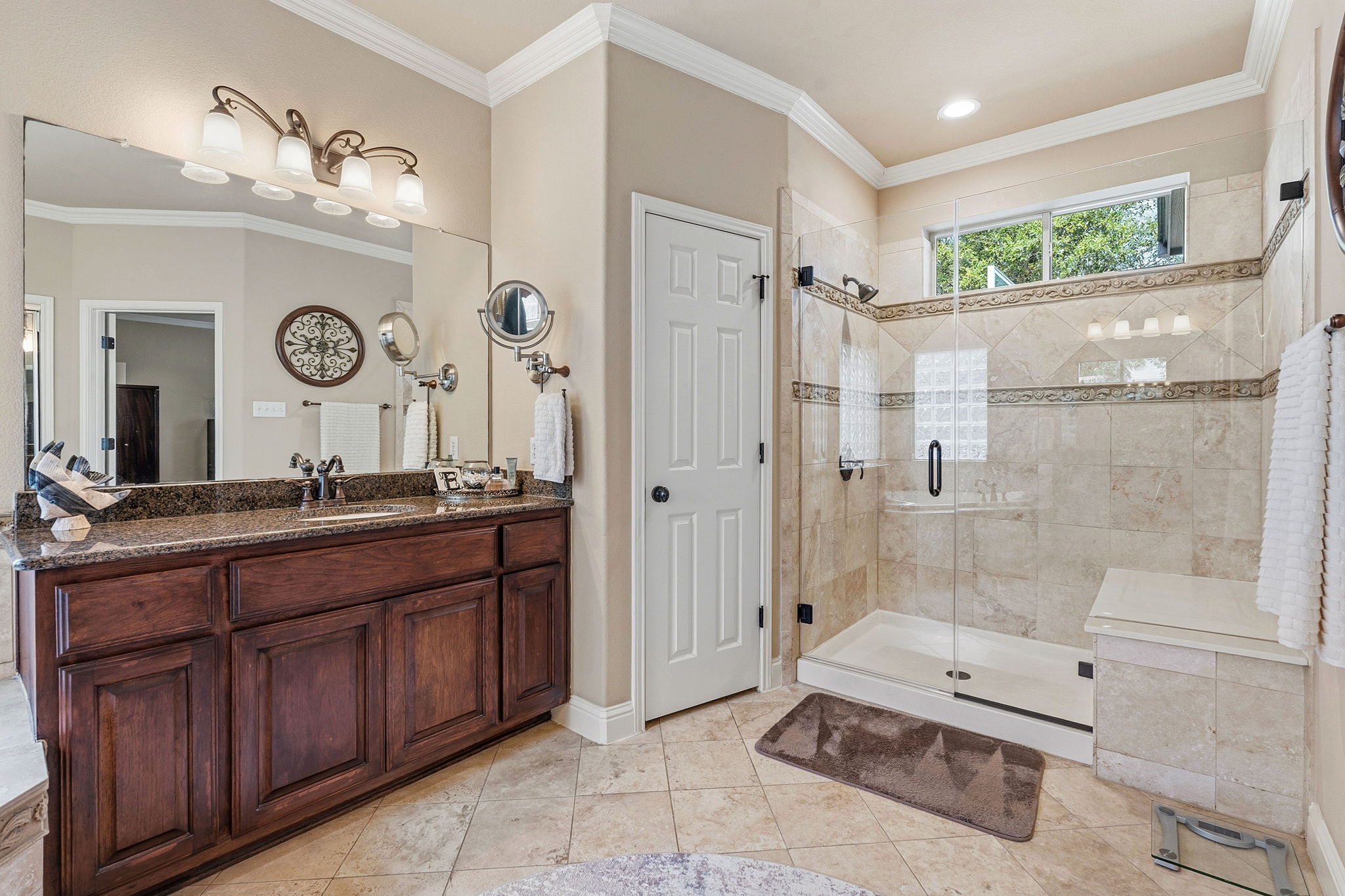 2807 Rambler Valley Drive Cedar Park, TX 78613 - Photo 23 of 38 a spacious bathroom with a granite countertop sink mirror toilet and shower