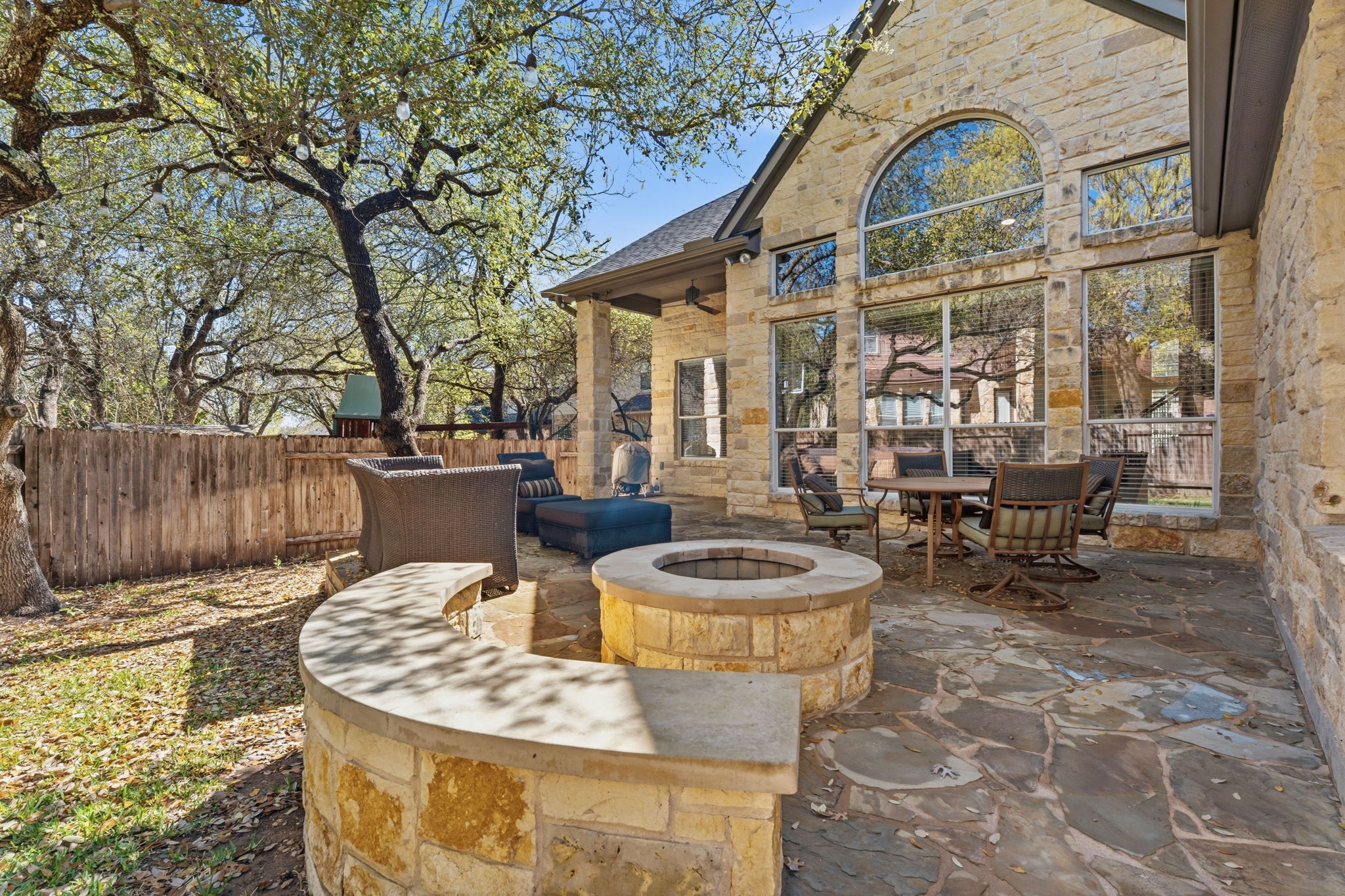 2807 Rambler Valley Drive Cedar Park, TX 78613 - Photo 30 of 38 a view of a patio with table and chairs and potted plants