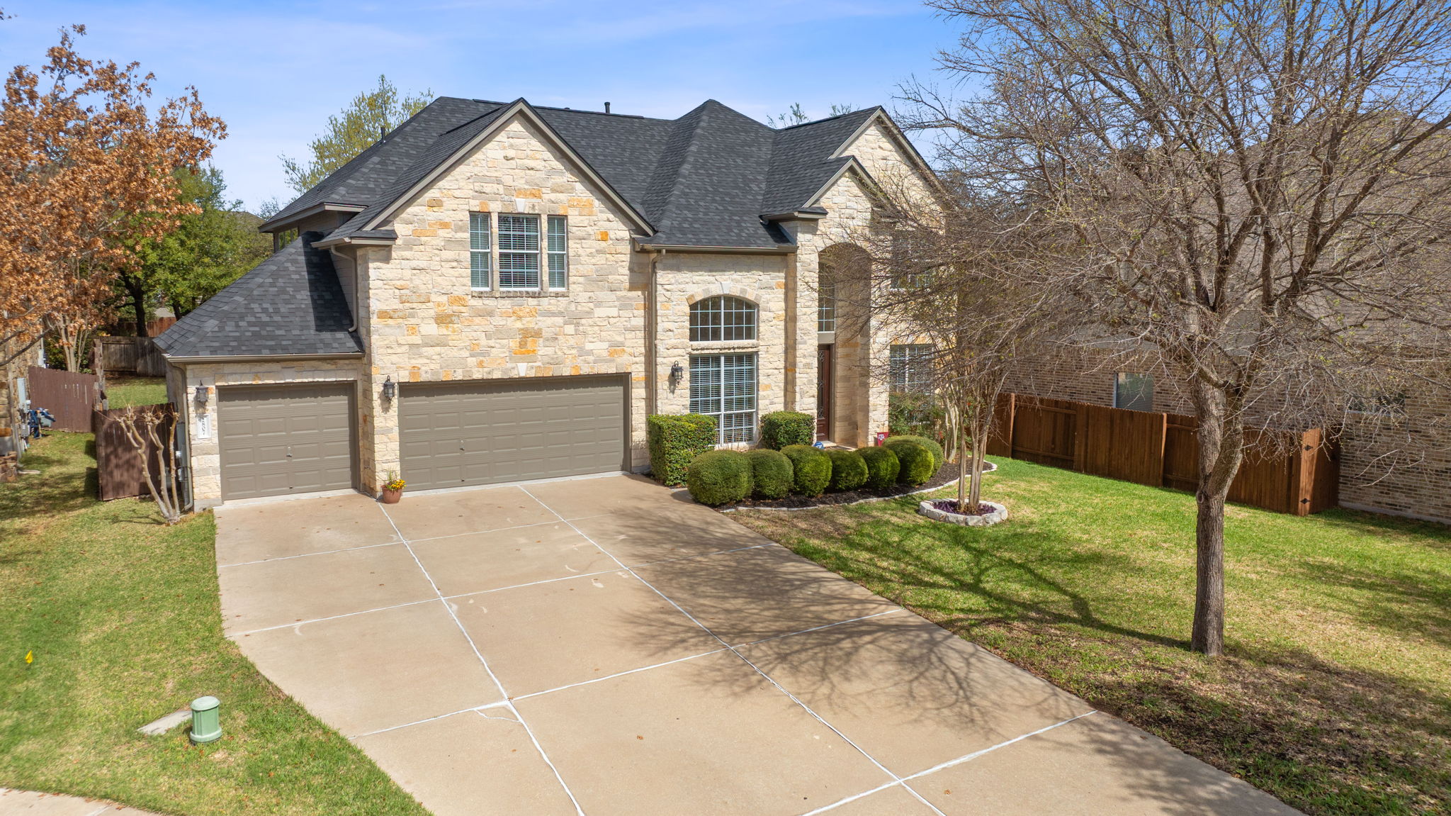 2807 Rambler Valley Drive Cedar Park, TX 78613 - Photo 38 of 38 a front view of a house with a yard and garage