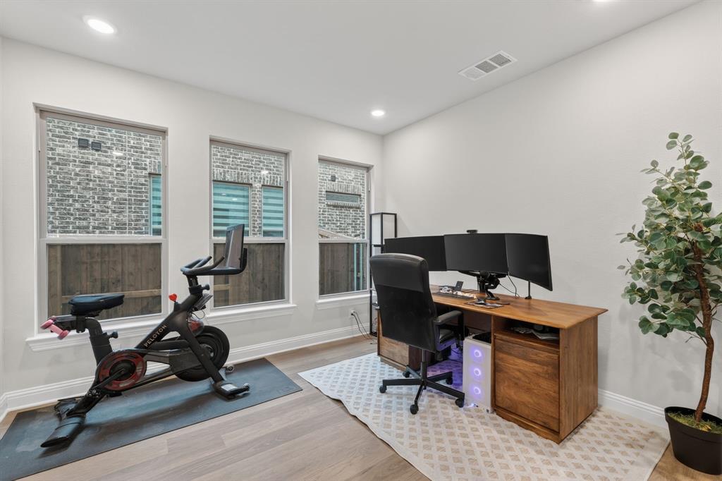 4150 Gambel Road Prosper, TX 75078 - Photo 8 of 39 Home office with light wood finished floors and recessed lighting