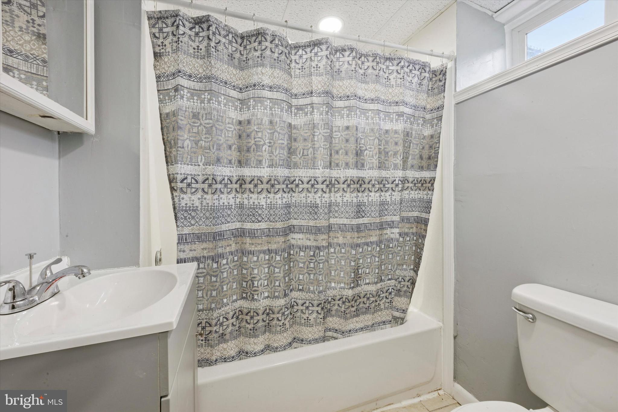 550 Wiltshire Road Upper Darby, PA 19082 - Photo 11 of 14 a bathroom with a sink toilet and shower