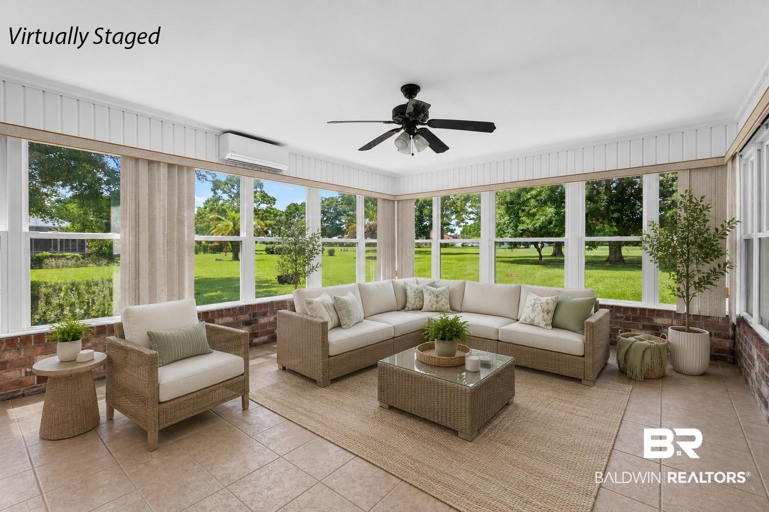 22685 County Road 12 Foley, AL 36535 - Photo 3 of 89 Sunroom featuring expansive windows, tile flooring, a ceiling fan, a split-system air conditioning unit, and a brick knee wall