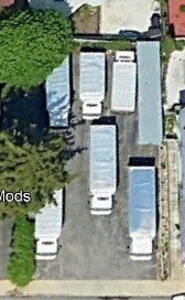 23 Chase Street Methuen, MA 01844 - Photo 2 of 3 a front view of a house with a yard