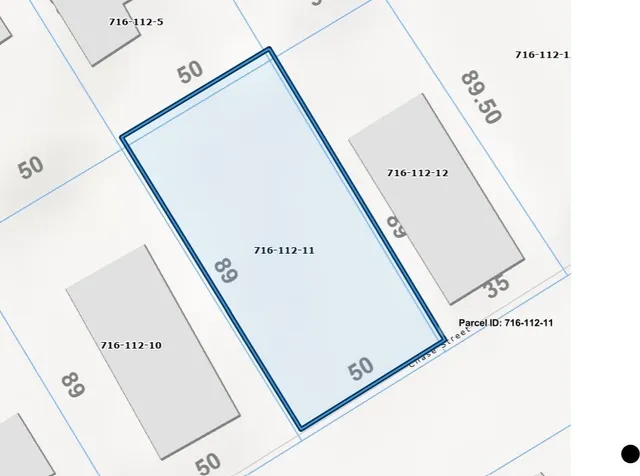 a view of a hallway with windows