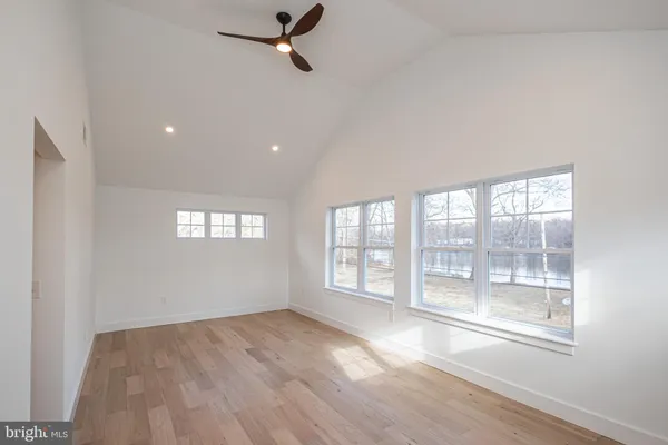a view of room with hardwood floor
