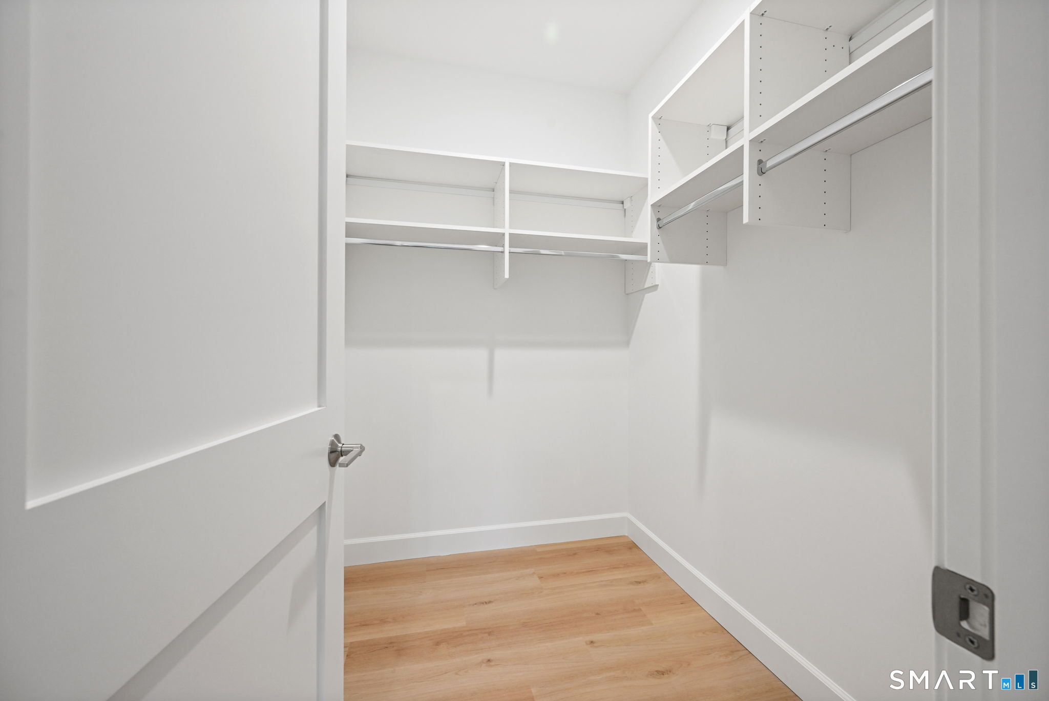 131 Beach Road, Unit 103 Fairfield, CT 06824 - Photo 19 of 28 a view of an empty walk in closet