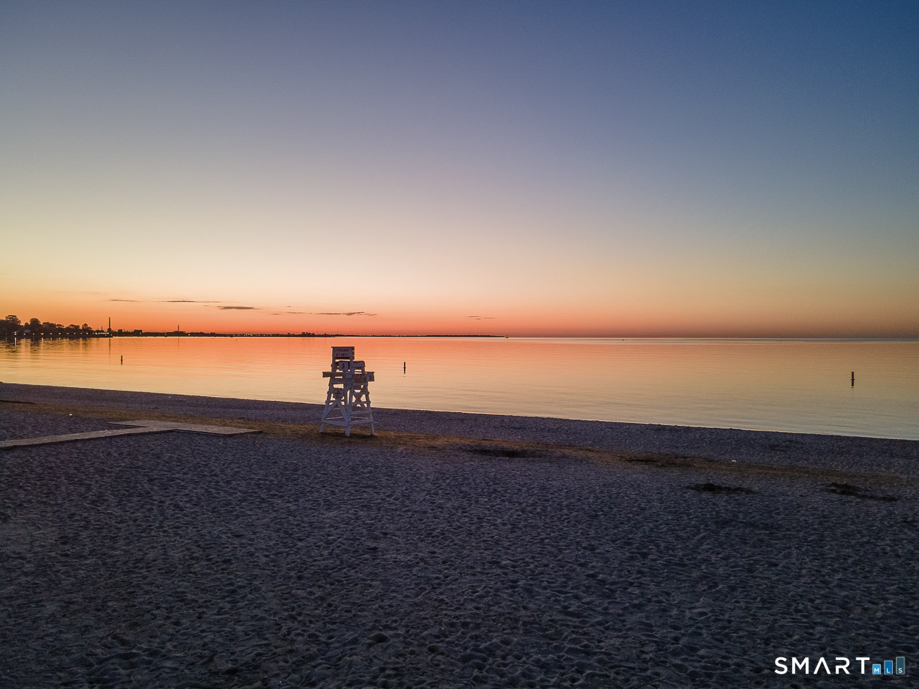 131 Beach Road, Unit 103 Fairfield, CT 06824 - Photo 25 of 28 a view of an ocean beach and an ocean