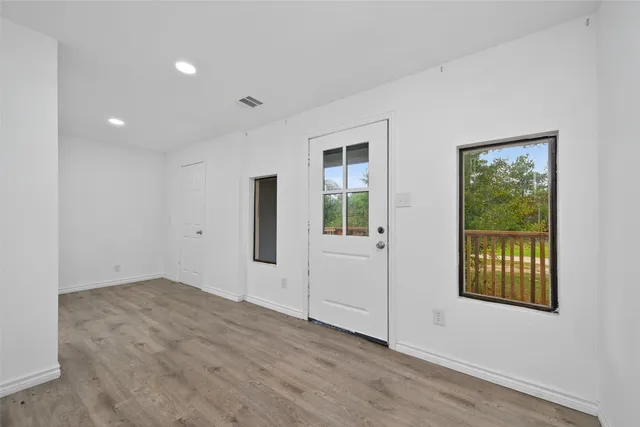 an empty room with windows