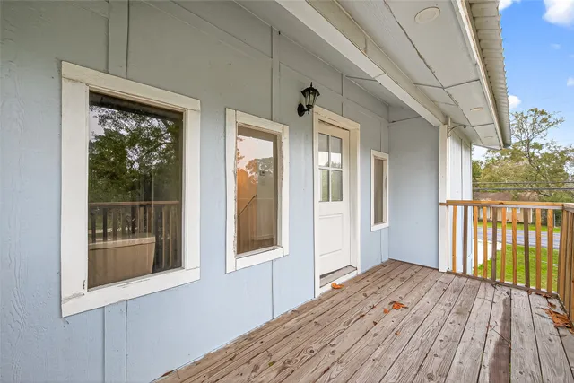 a view of a house with a wooden floor