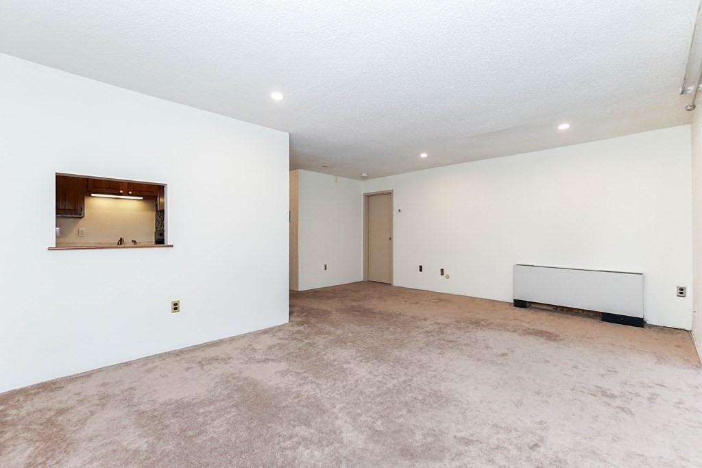 3 Summit Drive, Unit B2 Reading, MA 01867 - Photo 6 of 17 a view of an empty room